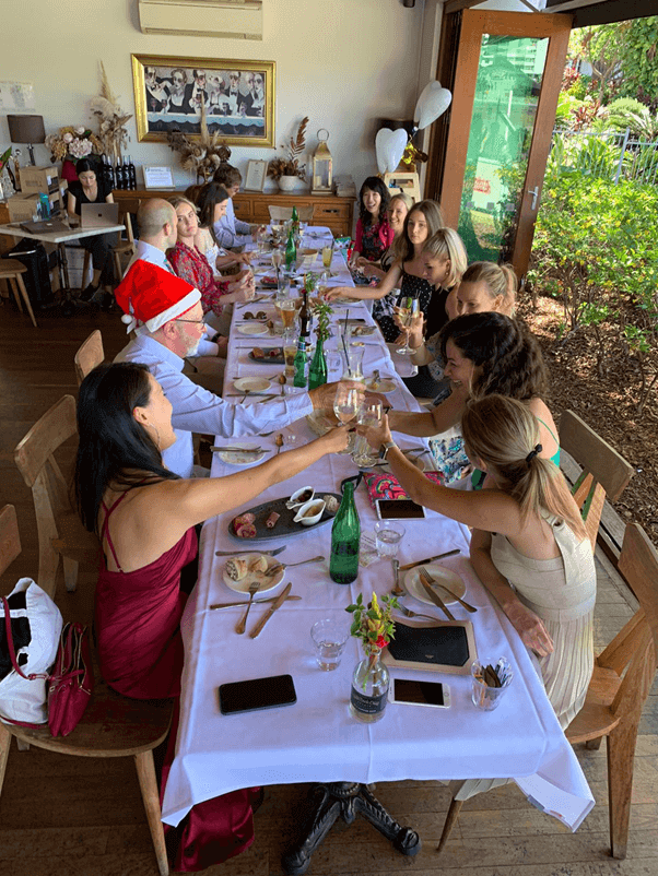 HighgateHillDental-Review-of-2020 Highgate Hill Staff cheering at the Christmas party